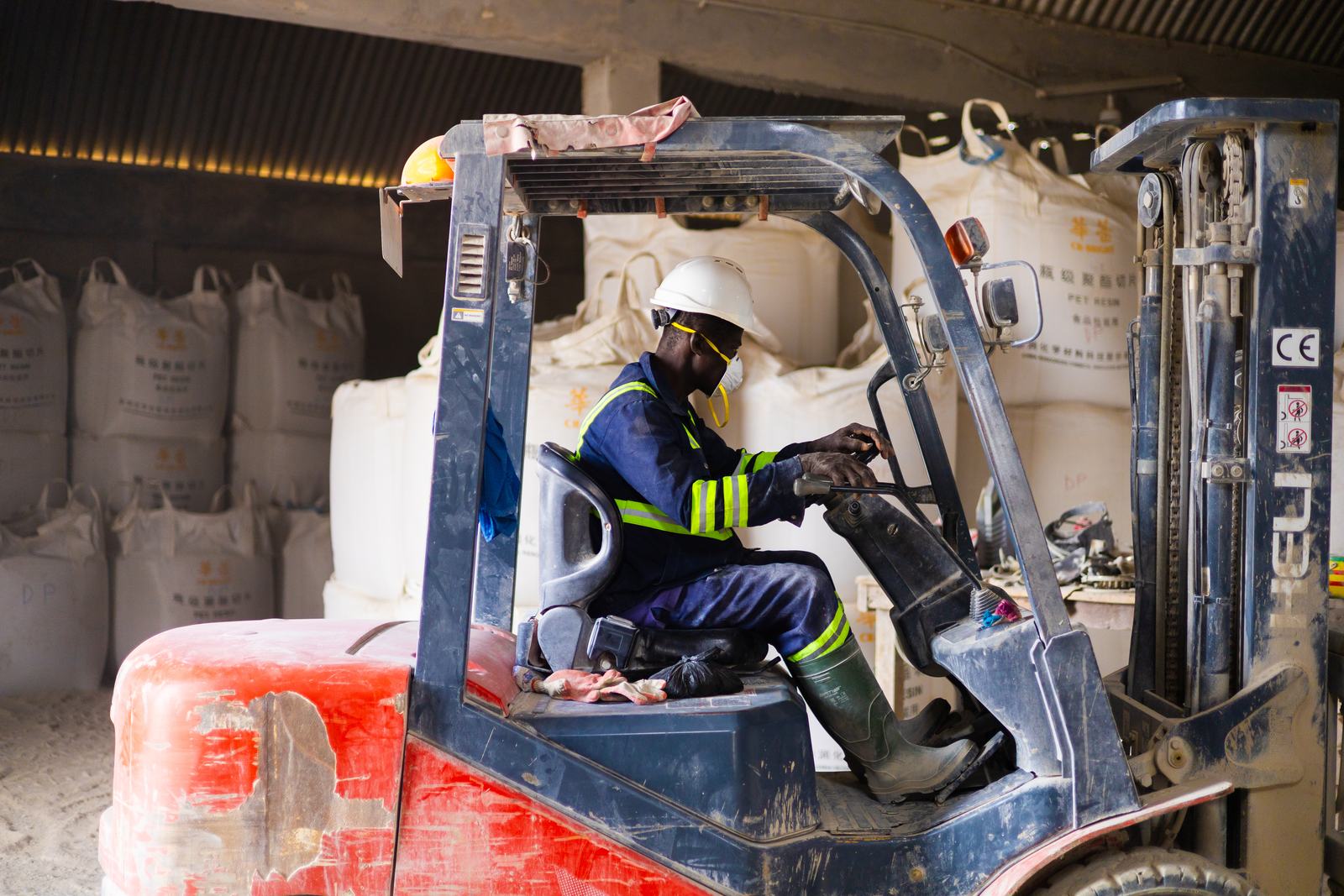 Forklift moving product in the warehouse